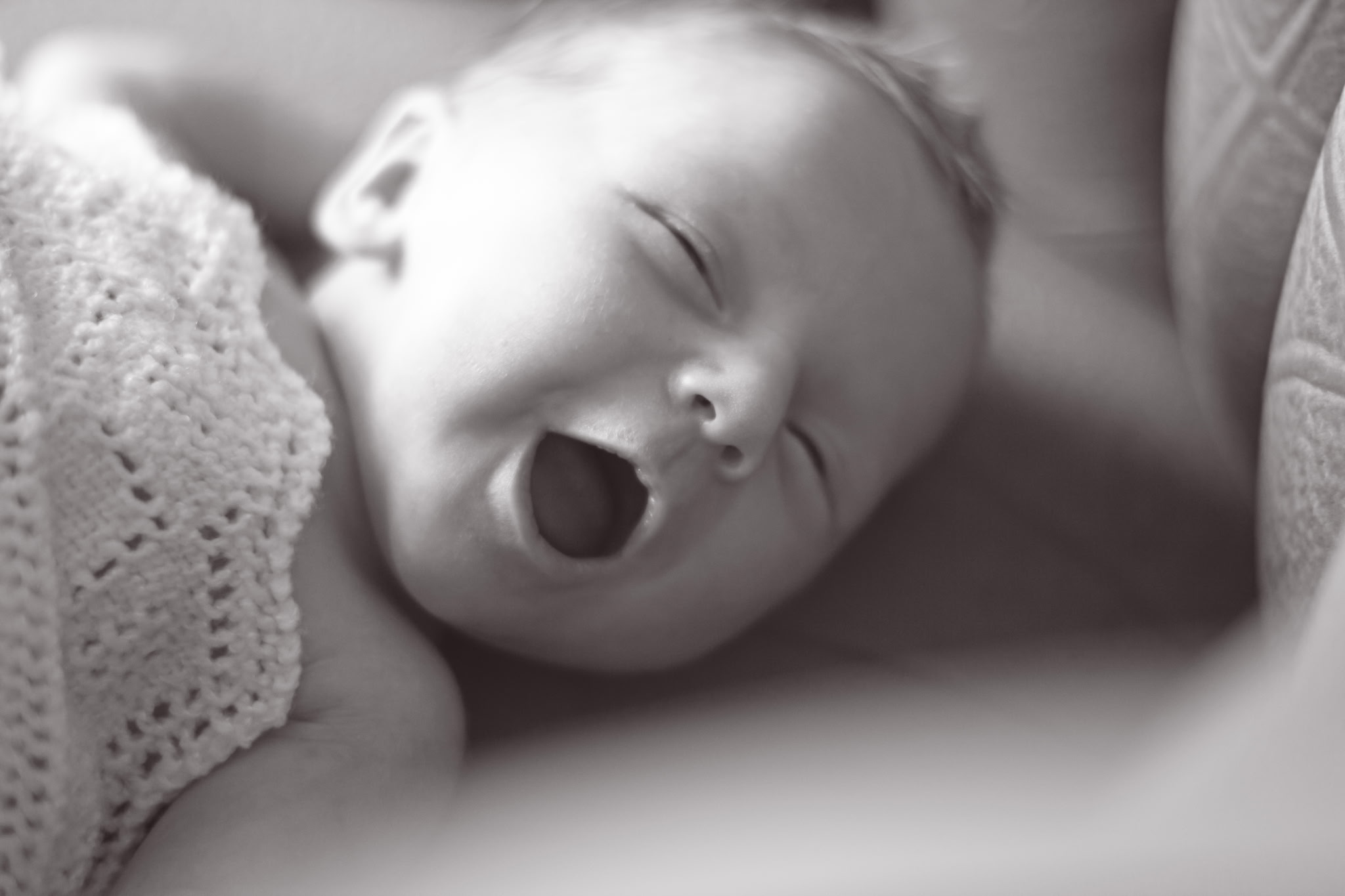 Newborn baby yawning