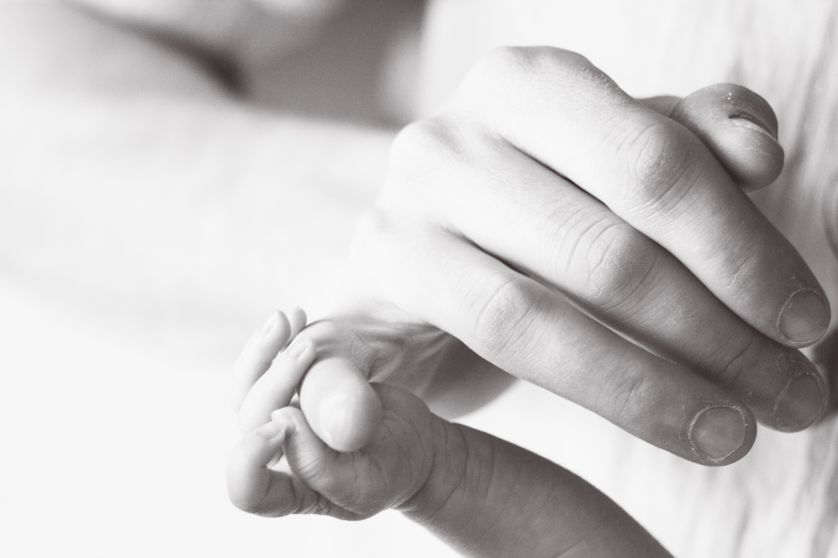 Gentle newborn hand